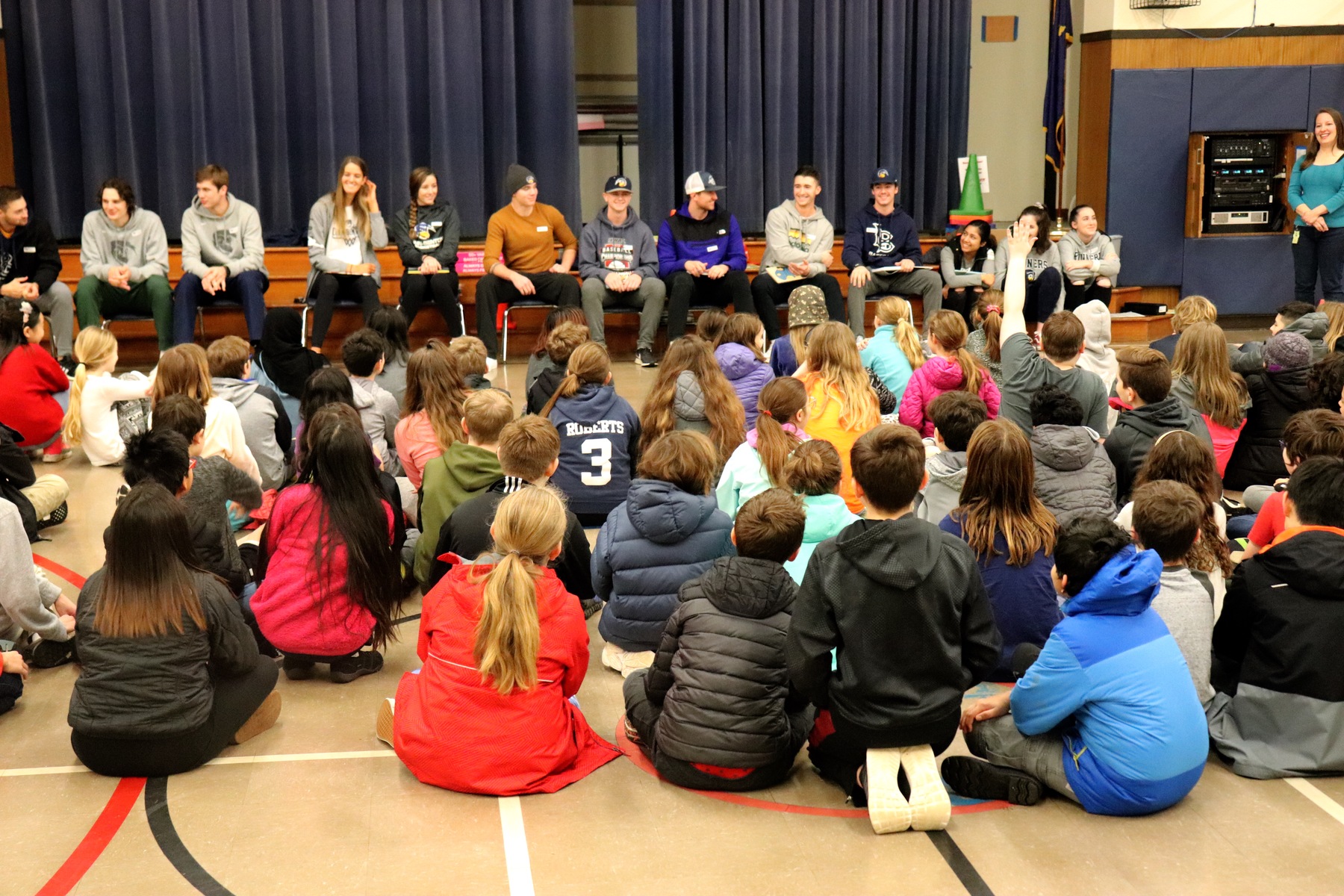 athletes and elementary students