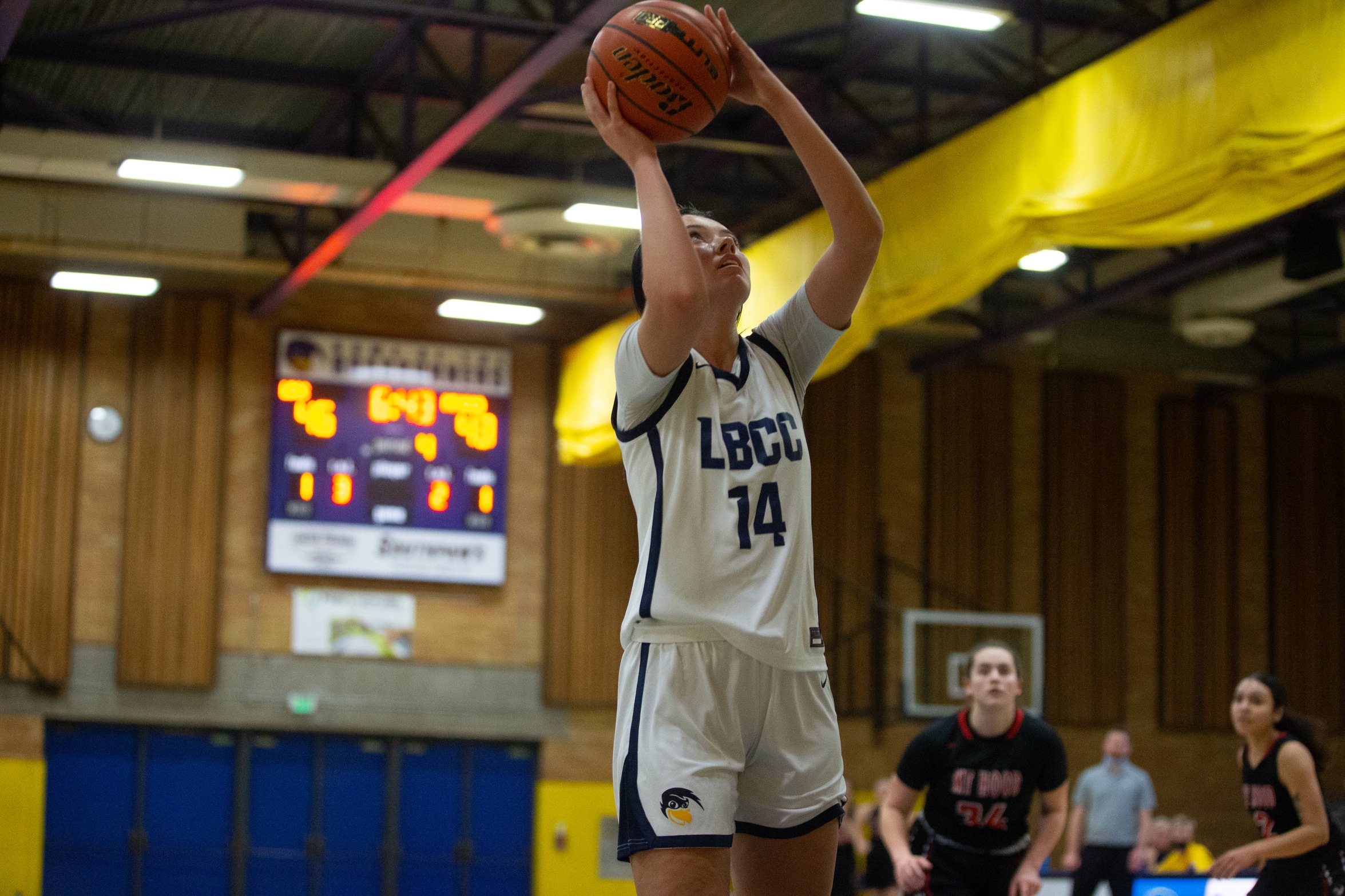Brooklynn Hankwitz attempts a layup in a game against Mt. Hood Community College. Photo- Logan Hannigan-Downs.
