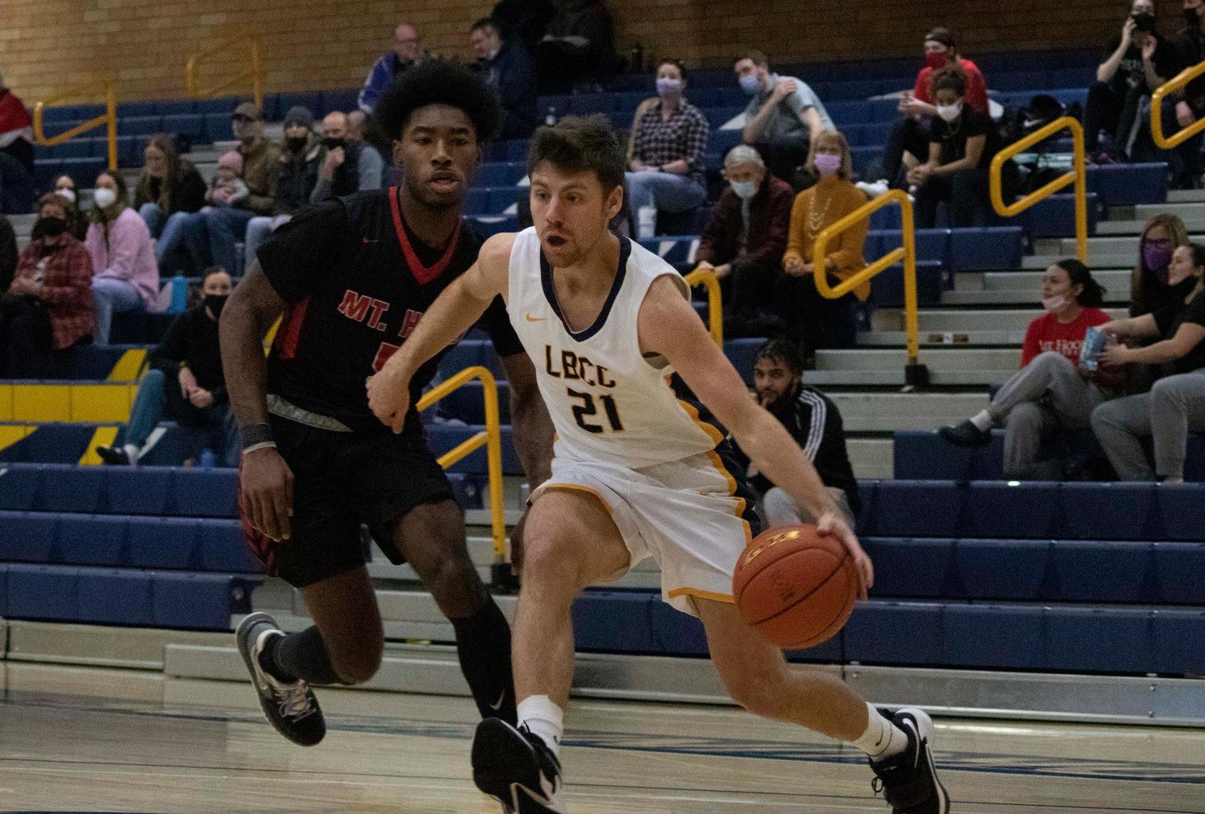 Roadrunner Kye Blaser drives to the basket in a game against Mt. Hood Community College.