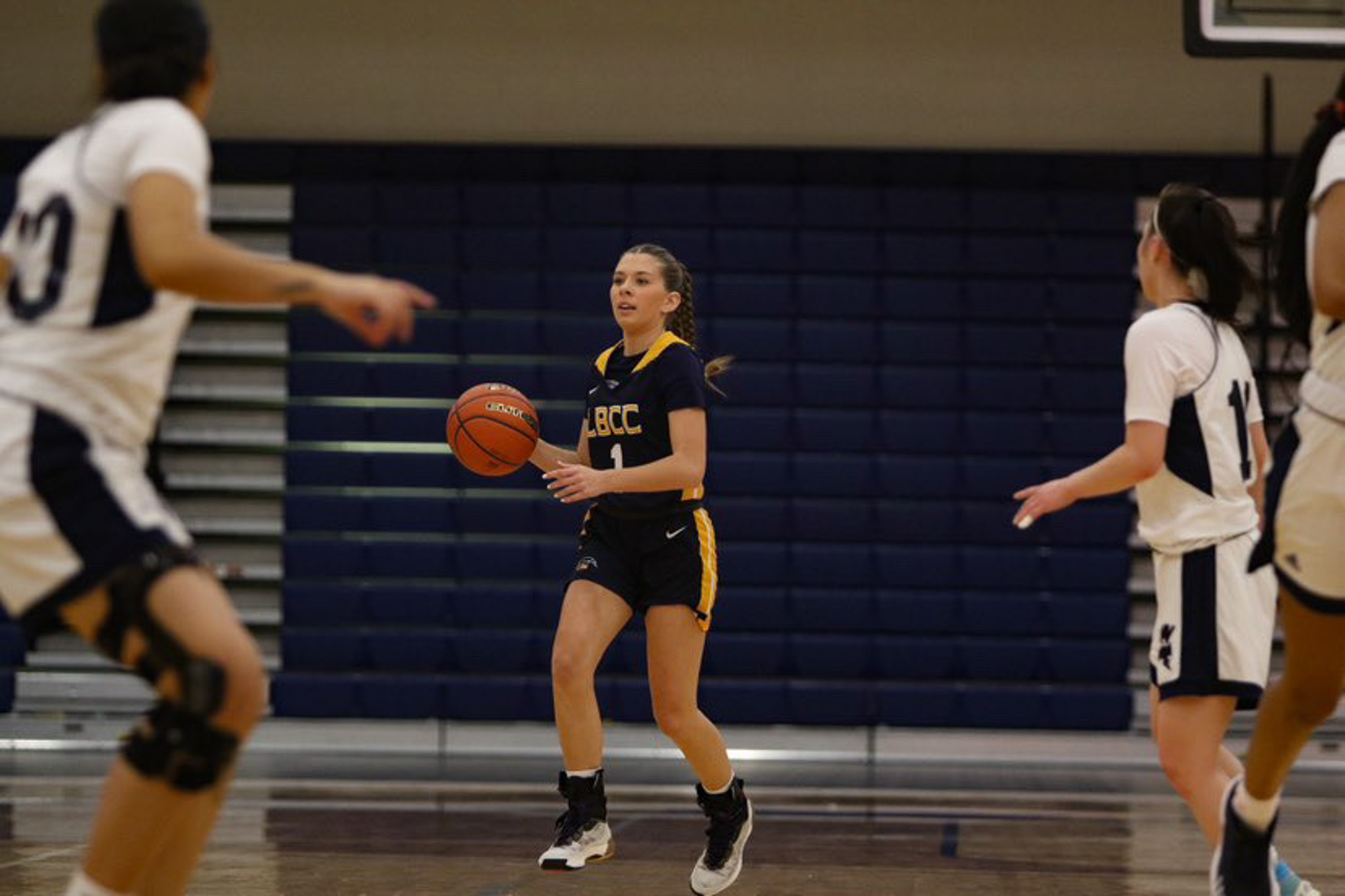 Roadrunners Laney Snelling pushes the ball up the court in a game against Tacoma Community College on Saturday, Dec. 10.