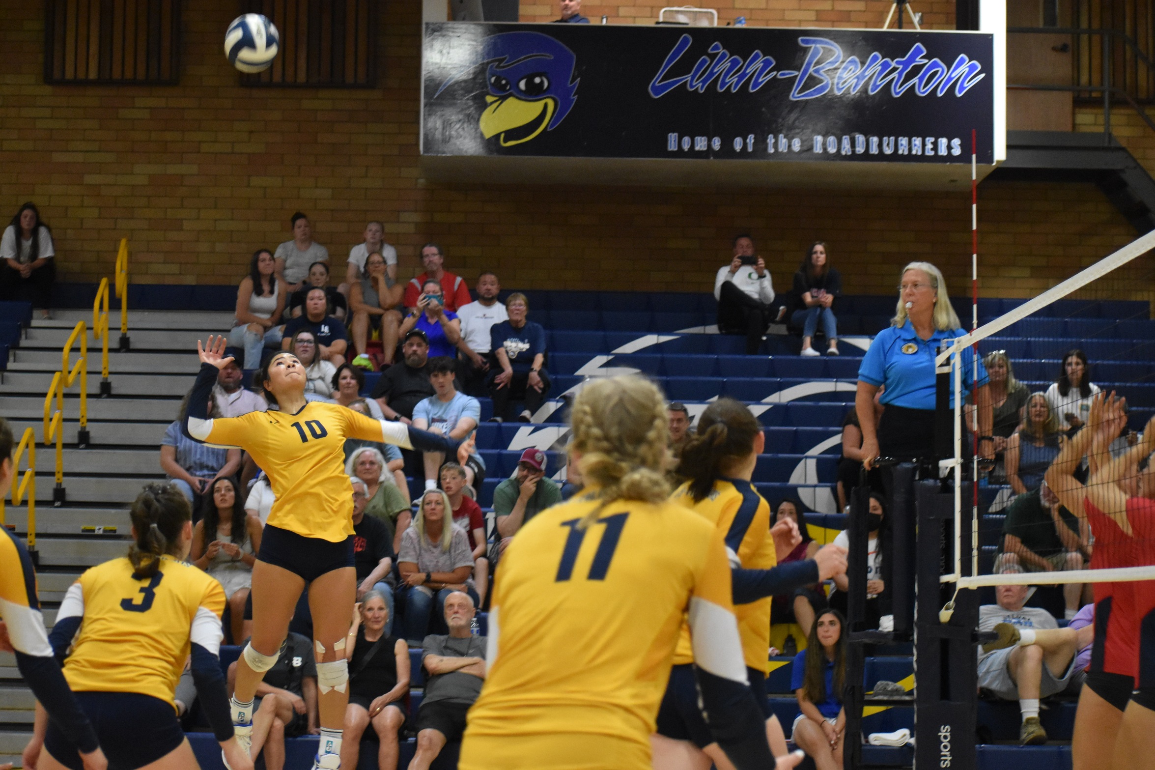 Roadrunners Taya Manibusan attempts to hit the ball in a match against Clackamas Community College on Friday, Sept. 9.